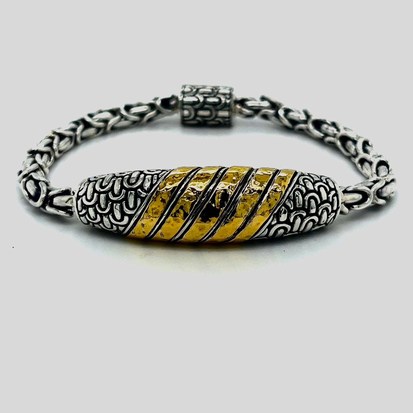 Silver bracelet with 18kt Gold accent