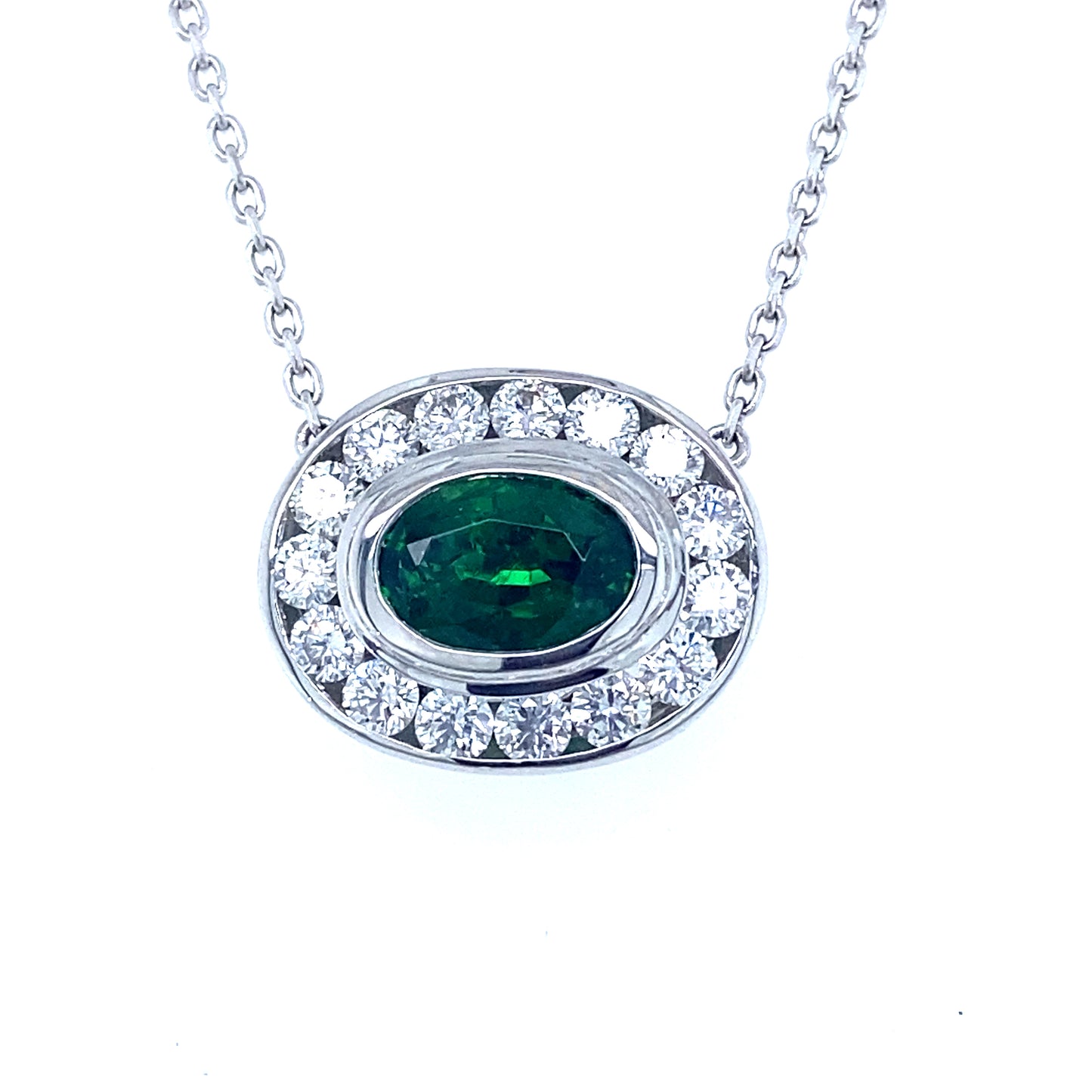 Platinum & 18 kt gold necklace with Tsavorite center and diamonds with diamond chain