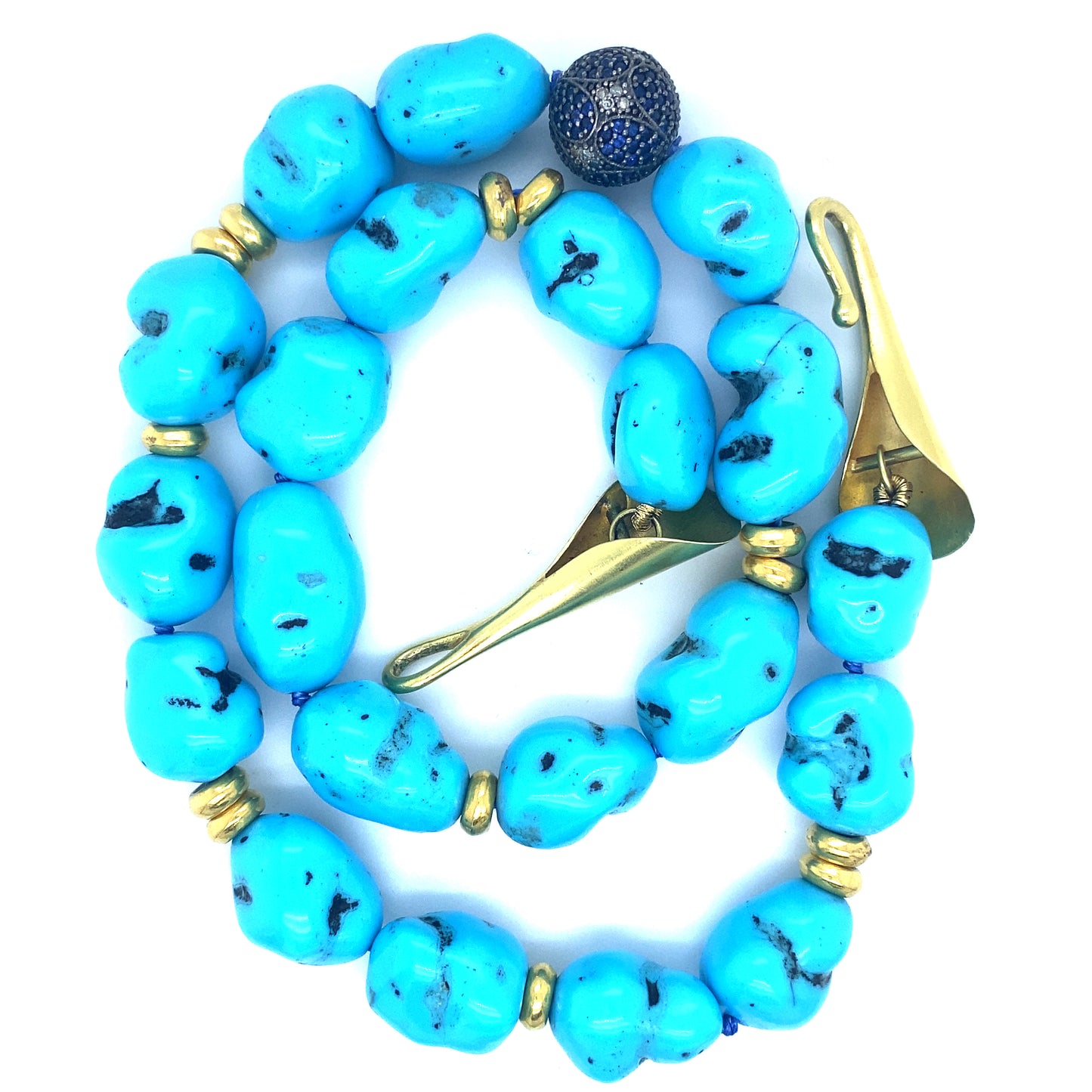 Turquoise with 18 kt gold clasp and blue sapphire silver bead