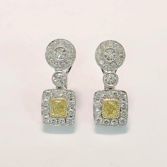 18 kt gold hanging earrings with fancy yellow & white diamonds