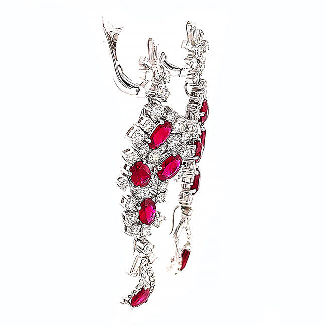 Platinum dangling earrings with no heat Ruby’s and diamonds