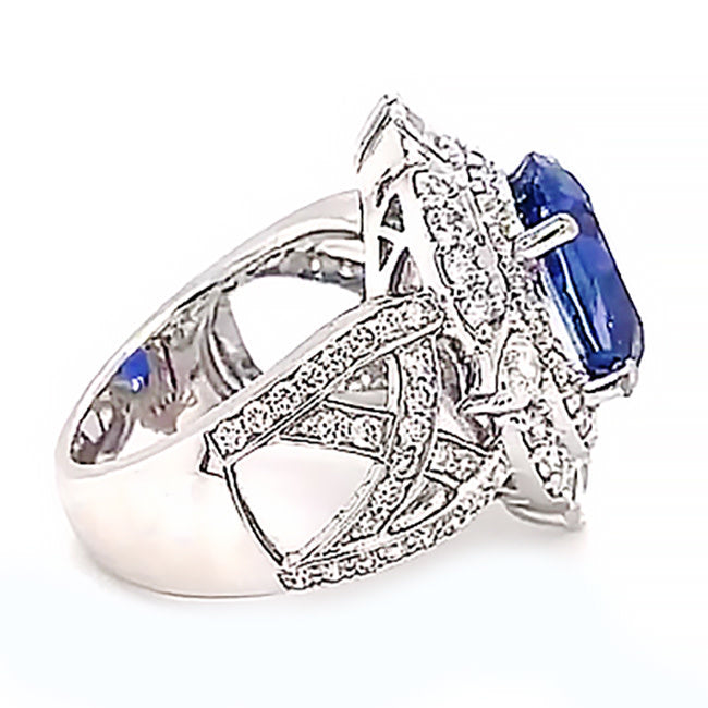 Platinum engagement ring with 7.5 ct blue Sapphire and diamonds. Call for price.