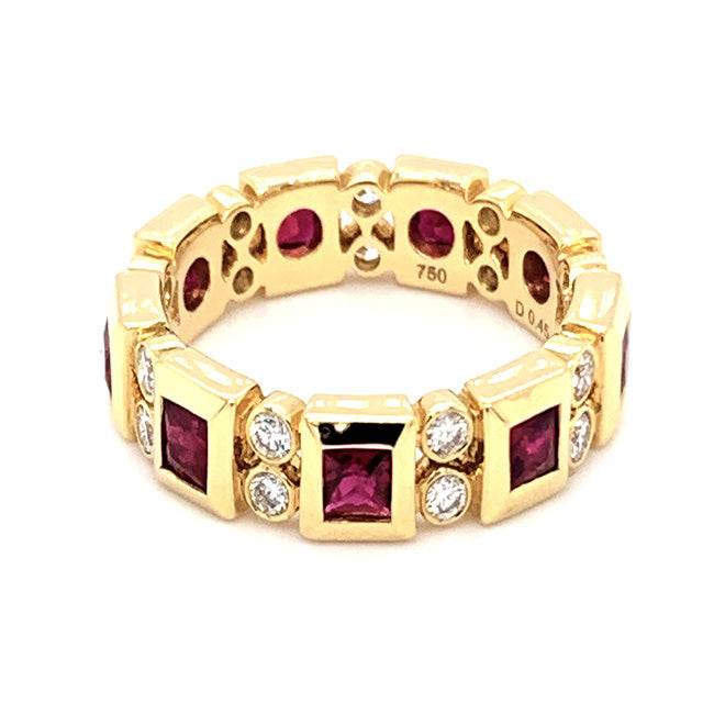 18 kt yellow gold eternity band with Ruby’s and diamonds