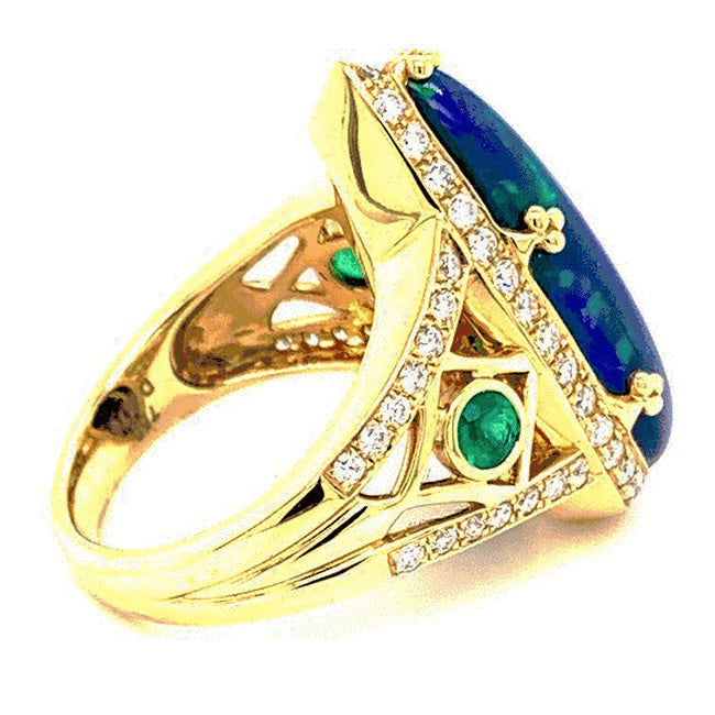 18 kt yellow gold ring with Ethiopian Opal, Diamonds and emeralds