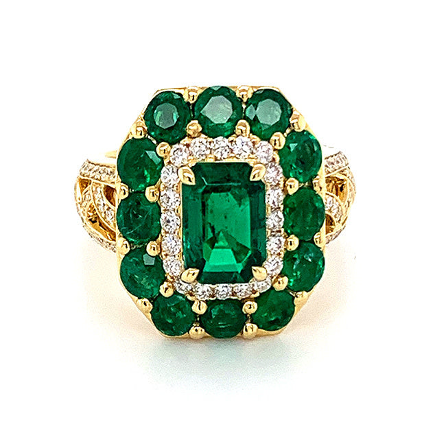 18 kt yellow gold engagement ring with Emerald center and side Emeralds & Diamonds