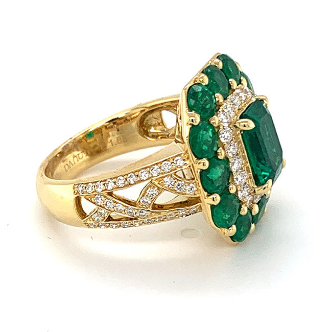 18 kt yellow gold engagement ring with Emerald center and side Emeralds & Diamonds