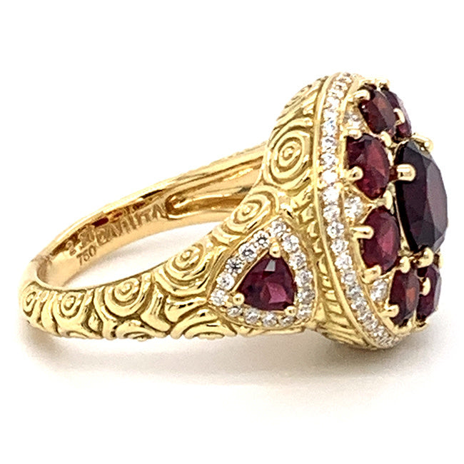 18 kt yellow gold ring with Celtic design garnets and diamonds
