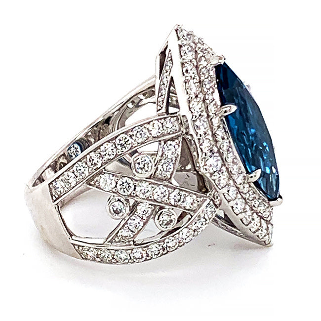 Platinum engagement ring with Marque Rare Blue Zircon and diamonds