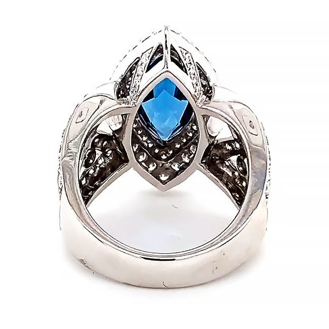 Platinum engagement ring with Marque Rare Blue Zircon and diamonds