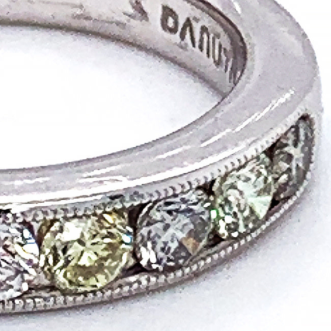 Platinum channel set band with natural color diamonds