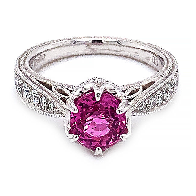 Platinum engagement ring with pink sapphire and diamonds