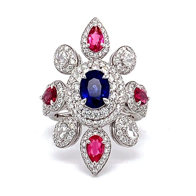 Platinum ring with blue sapphire and pink spinels & diamonds