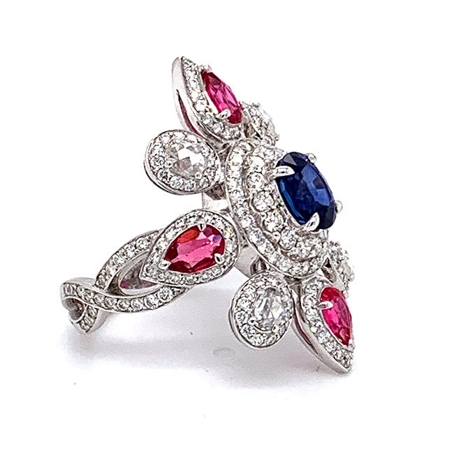 Platinum ring with blue sapphire and pink spinels & diamonds